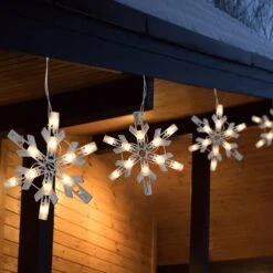 Northlight Twinkling Icicle Snowflake Christmas Lights - Clear - 8.6' White Wire - 100ct -Northlight 1153177127722503504 2