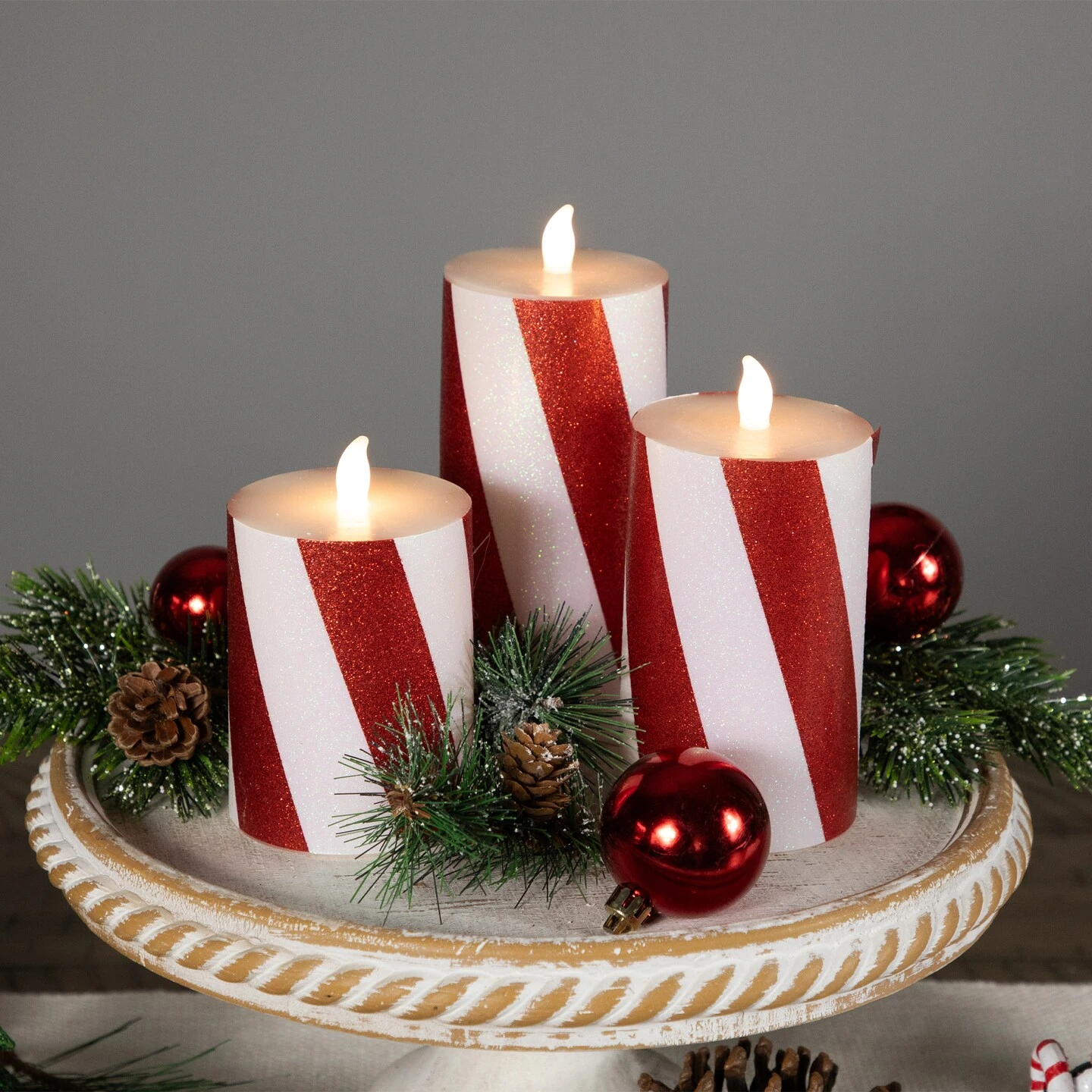 Northlight LED Flameless Flickering Candy Cane Wax Pillar Christmas Candles - 6" - Set Of 3 Red 6 Northlight LED Flameless Flickering Candy Cane Wax Pillar Christmas Candles - 6" - Set Of 3 Red - Image 4
