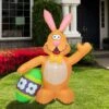 Northlight Inflatable LED Lighted Easter Bunny With Egg Outdoor Decoration - 4' Orange