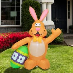 Northlight Inflatable LED Lighted Easter Bunny With Egg Outdoor Decoration - 4' Orange