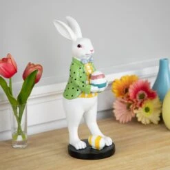 Northlight Rabbit Holding Easter Egg Outdoor Garden Statue - 11.5" - White Multi -Northlight 4611712249850082320
