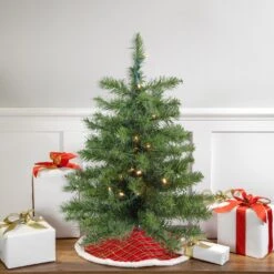 Northlight Pre-Lit Medium Canadian Pine Artificial Christmas Tree - 2' - Warm Clear Lights Green