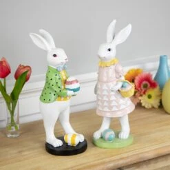 Northlight Rabbit Holding Easter Egg Outdoor Garden Statue - 11.5" - White Multi -Northlight 4612045962366530576