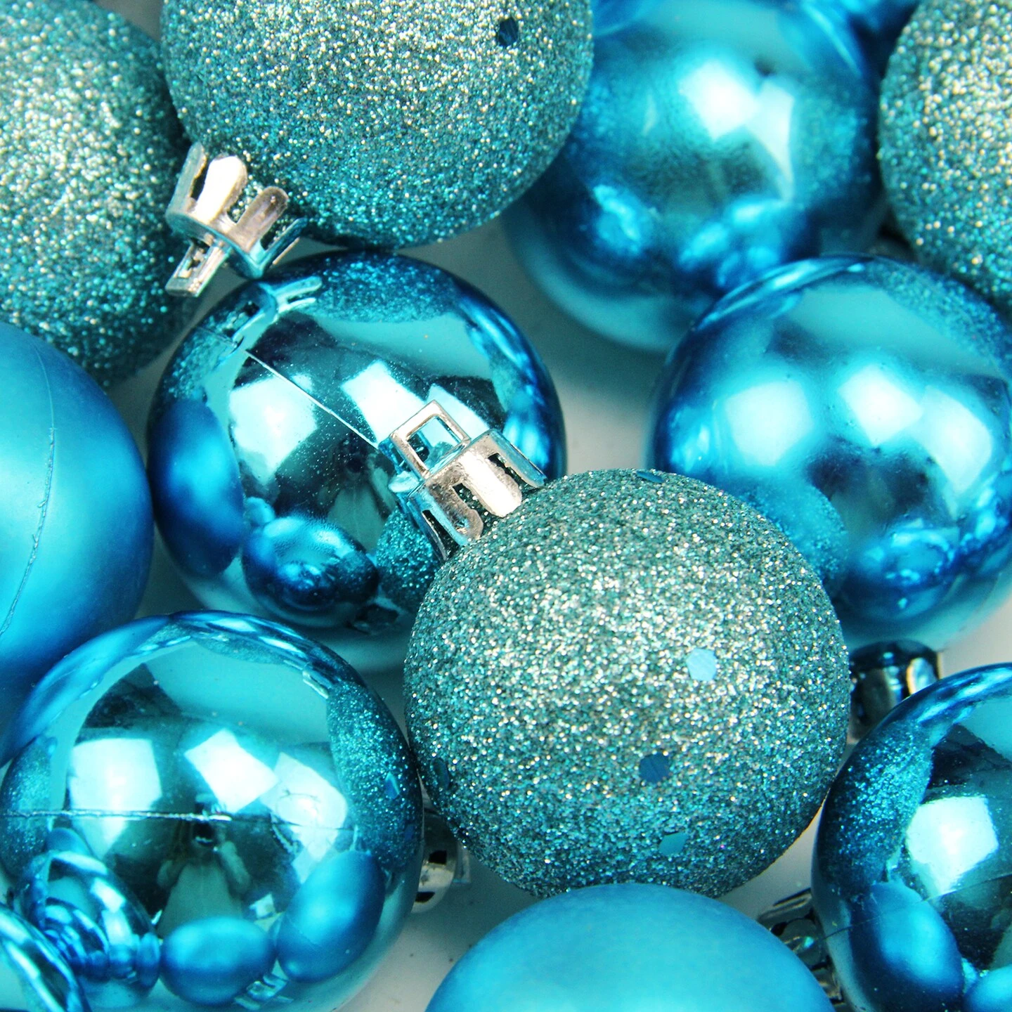 Northlight Shatterproof 4-Finish Christmas Ball Ornaments - 1.5" (40mm) - Turquoise Blue - 96ct 5 Northlight Shatterproof 4-Finish Christmas Ball Ornaments - 1.5" (40mm) - Turquoise Blue - 96ct - Image 3