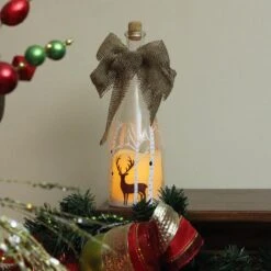 Northlight 10" LED Flameless Pillar Candle In A Clear Glass Bottle Lantern With Deer Accents -Northlight 4612210293594801376