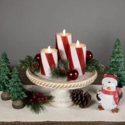 Northlight LED Flameless Flickering Candy Cane Wax Pillar Christmas Candles - 6" - Set Of 3 Red 12 Northlight LED Flameless Flickering Candy Cane Wax Pillar Christmas Candles - 6" - Set Of 3 Red -Northlight 5764753749780284640