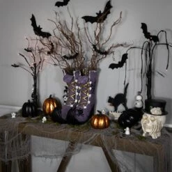 Northlight 15" Purple Witch's Boots Ceramic Halloween Decoration 11 Northlight 15" Purple Witch's Boots Ceramic Halloween Decoration -Northlight D800589S 2