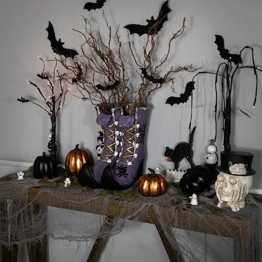 Northlight 15" Purple Witch's Boots Ceramic Halloween Decoration 5 Northlight 15" Purple Witch's Boots Ceramic Halloween Decoration - Image 3