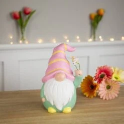 Northlight 8" Pink & Green Gnome Holding Flowers Spring Figurine 10 Northlight 8" Pink & Green Gnome Holding Flowers Spring Figurine -Northlight D827174S 2